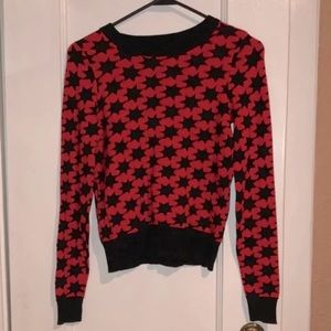 Black and red sweater with stars pattern